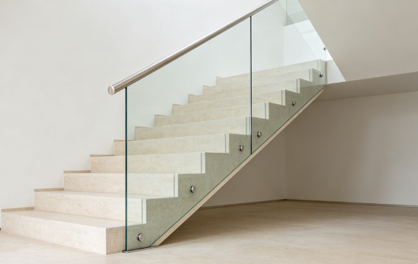 Side-mounted fascia standoff clamp glass railing system